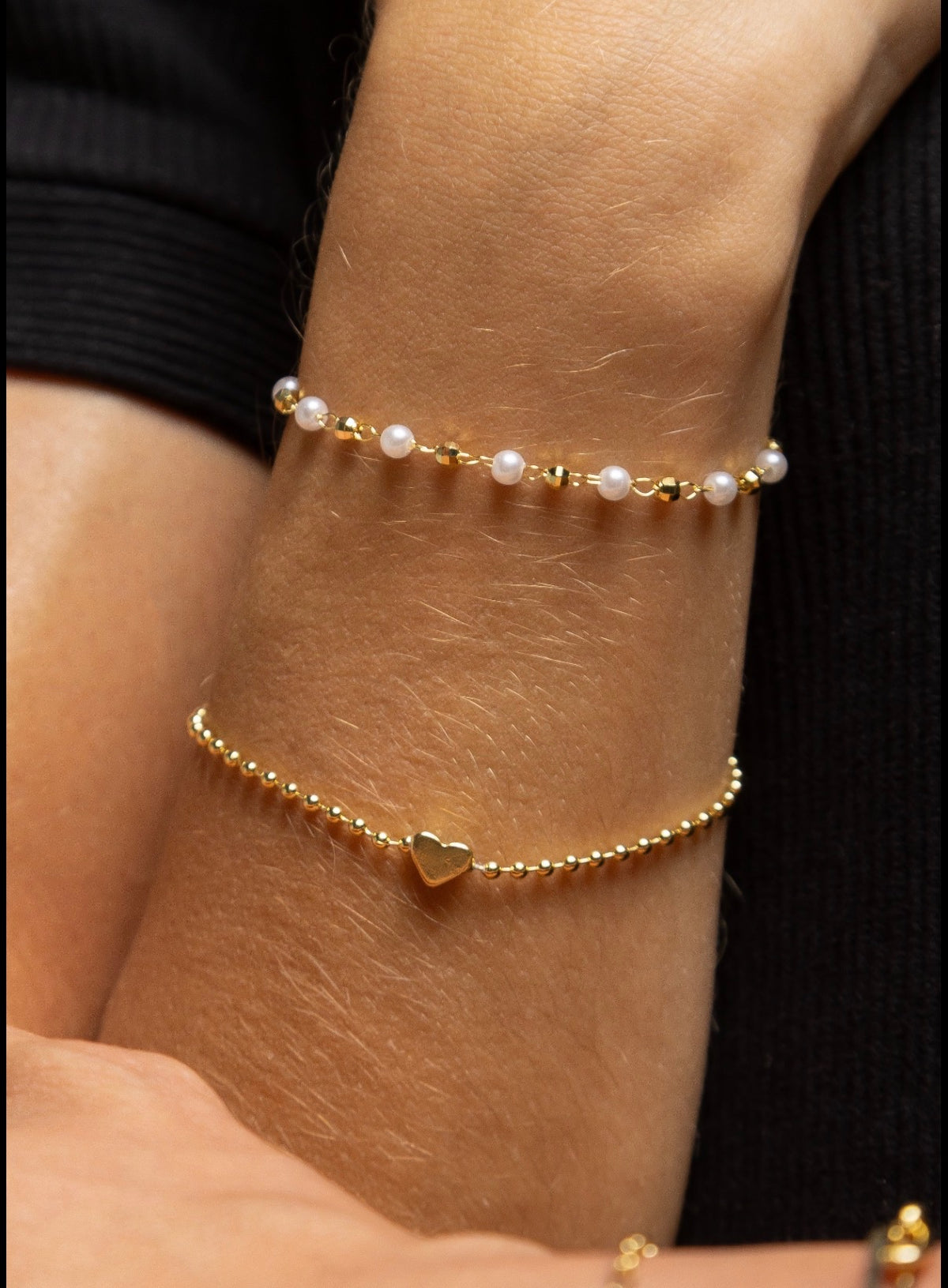 Pulseira bolinha com coração